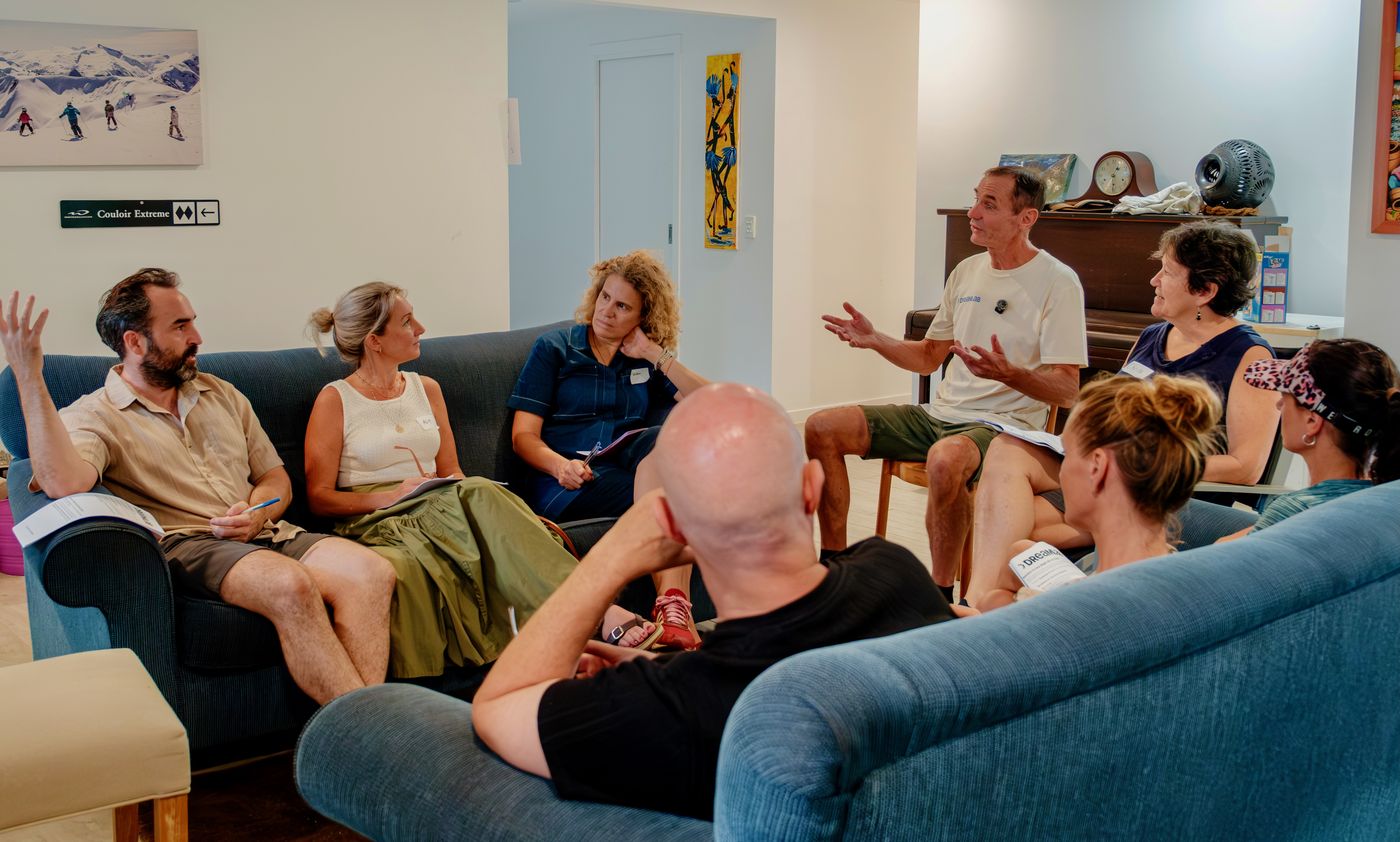 Mike leading a relaxed group conversation in the Dream Lab studio